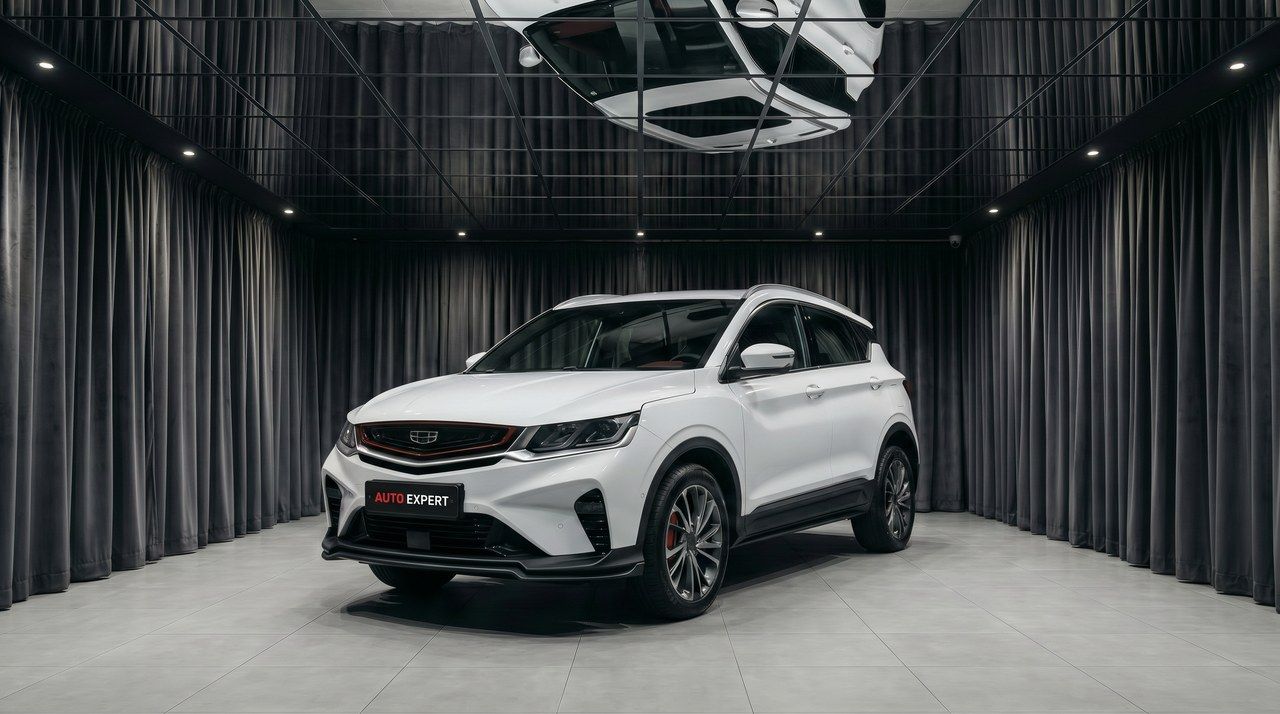 A car against black drapes