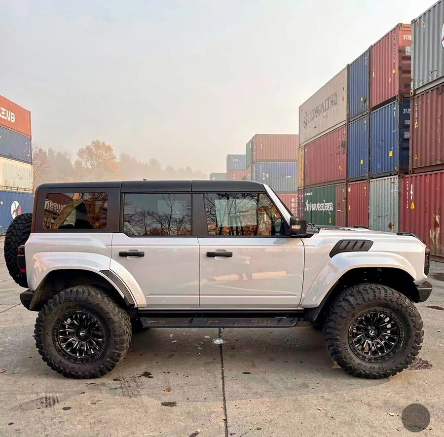 SUV in a parking lot — the walk-around point for four angles